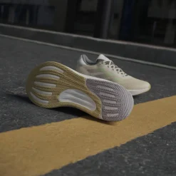 Adidas Women's Supernova Stride Move for the Planet Shoes Crystal Sand/Green Spark/Preloved Fig