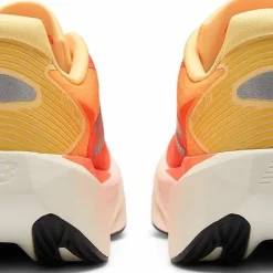 New Balance Women's Fuelcell Rebel V5 Tangerine Heat