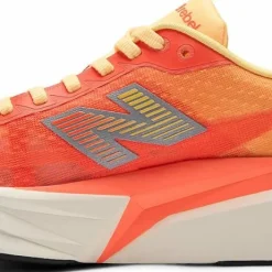New Balance Women's Fuelcell Rebel V5 Tangerine Heat