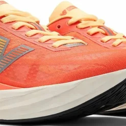 New Balance Women's Fuelcell Rebel V5 Tangerine Heat